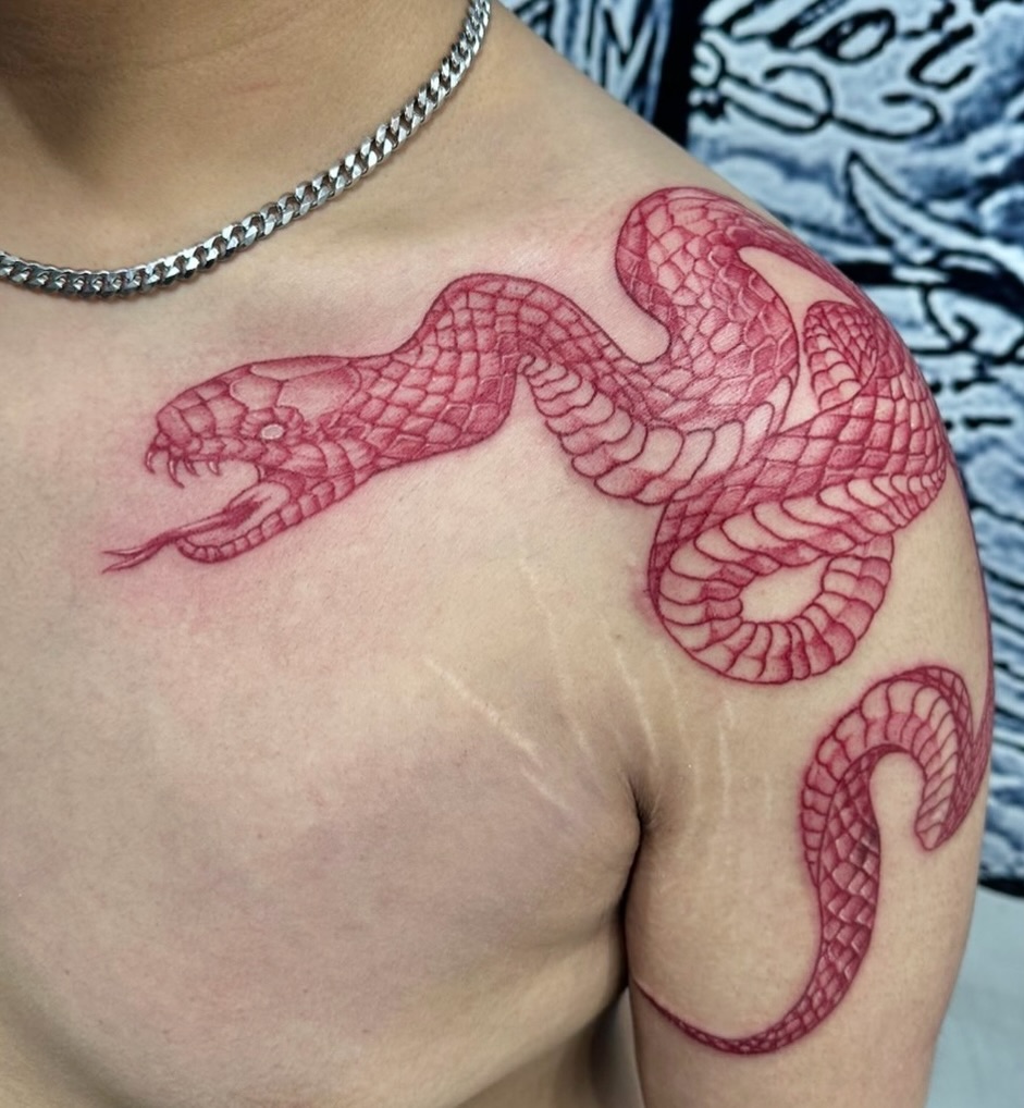 Pu Chao Saming Phrai Tattoo β Thai Tiger Sak Yant A traditional Pu Chao Saming Phrai tattoo featuring a powerful tiger head, Thai ornamental crown det