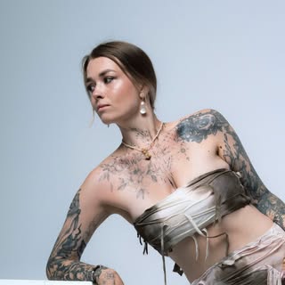 Yuliia Babych tattoo  AUSTIN / NYC - Soundwave tattoo artist in Austin, United States of America
