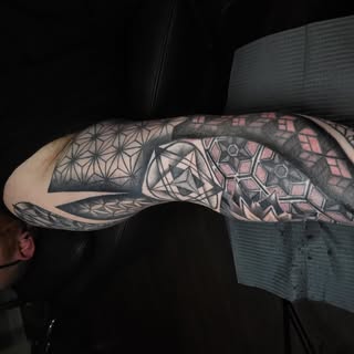 Jorge Rivera (Tattoo Artist) - Soundwave tattoo artist in Central Florida, United States of America