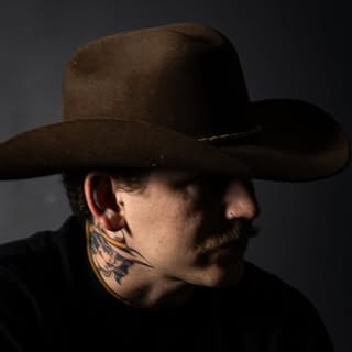 Rooster Quade Tracht - Soundwave tattoo artist in Grafton, United States of America