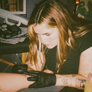 Grace Wise - Handpoke Tattoos - Soundwave tattoo artist in New Braunfels, United States of America